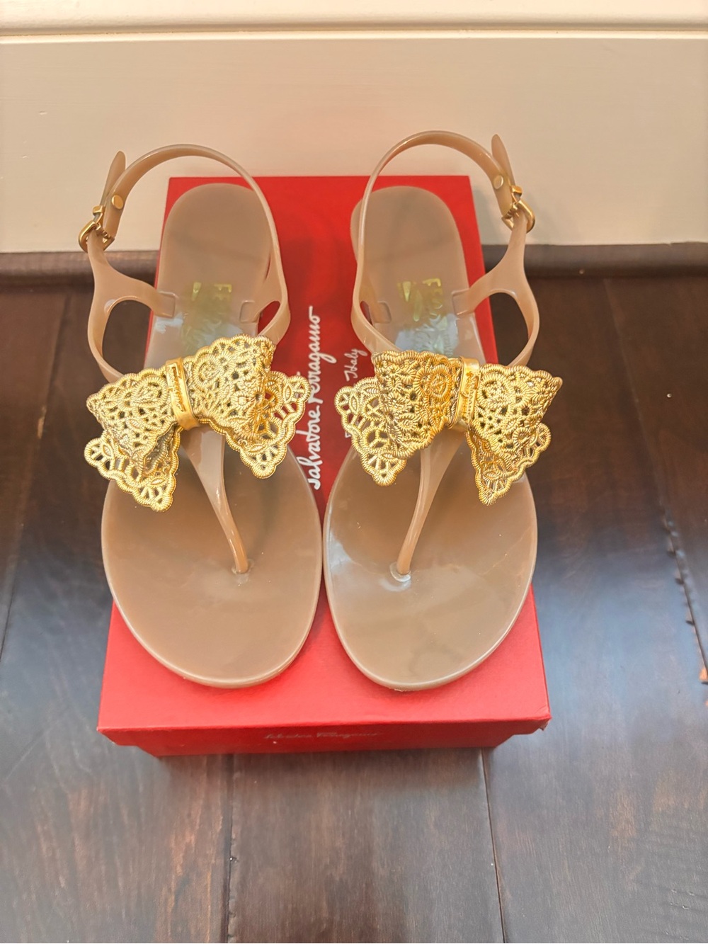 Salvatore Ferragamo Nude Jelly Sandals with Gold Filigree Bows